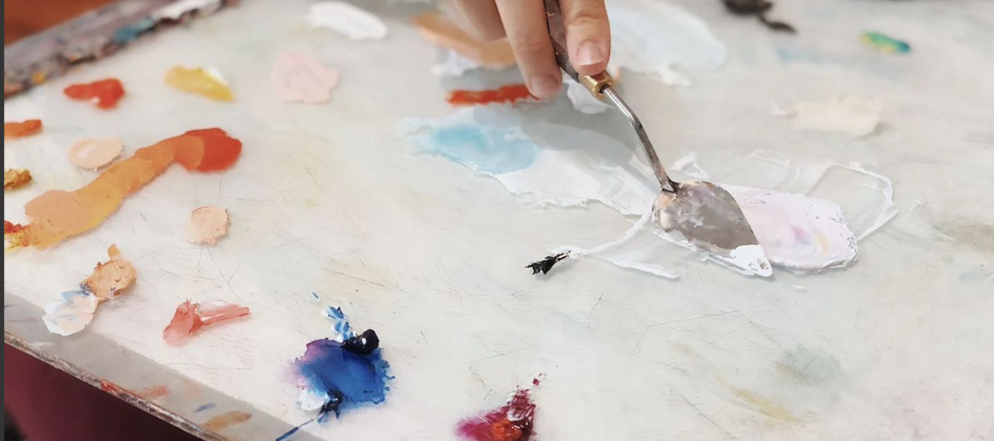 Art materials arranged for a private creative masterclass